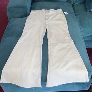 NWT We The Free flare jeans size 32 raw hem
